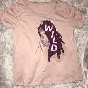 Shirt with reversible sequins